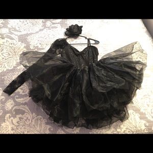 Sequin and lace leotard with tutu.
